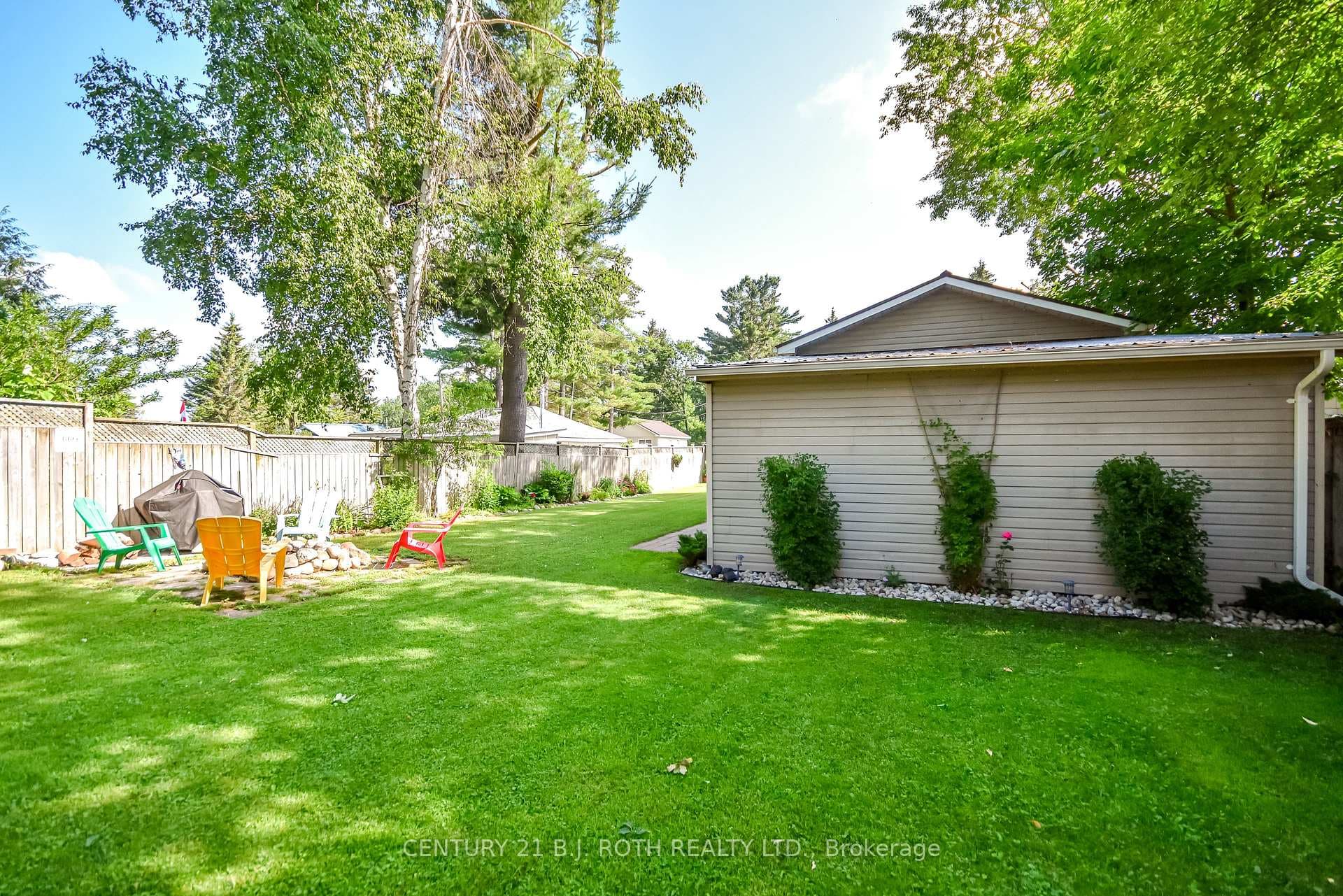 Expansive lawn is exceptionally well maintained