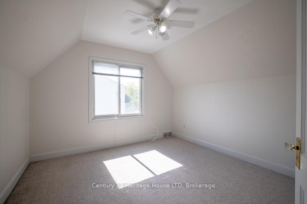 Bedroom 3 w/ Lofted Ceiling and Ceiling Fan