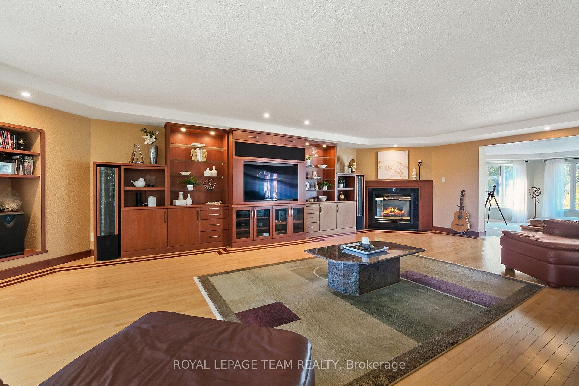 Inlay design in hardwood highlight custom cabinets