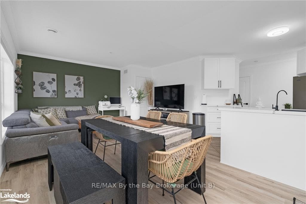 Dining space featuring light wood-type flooring, c