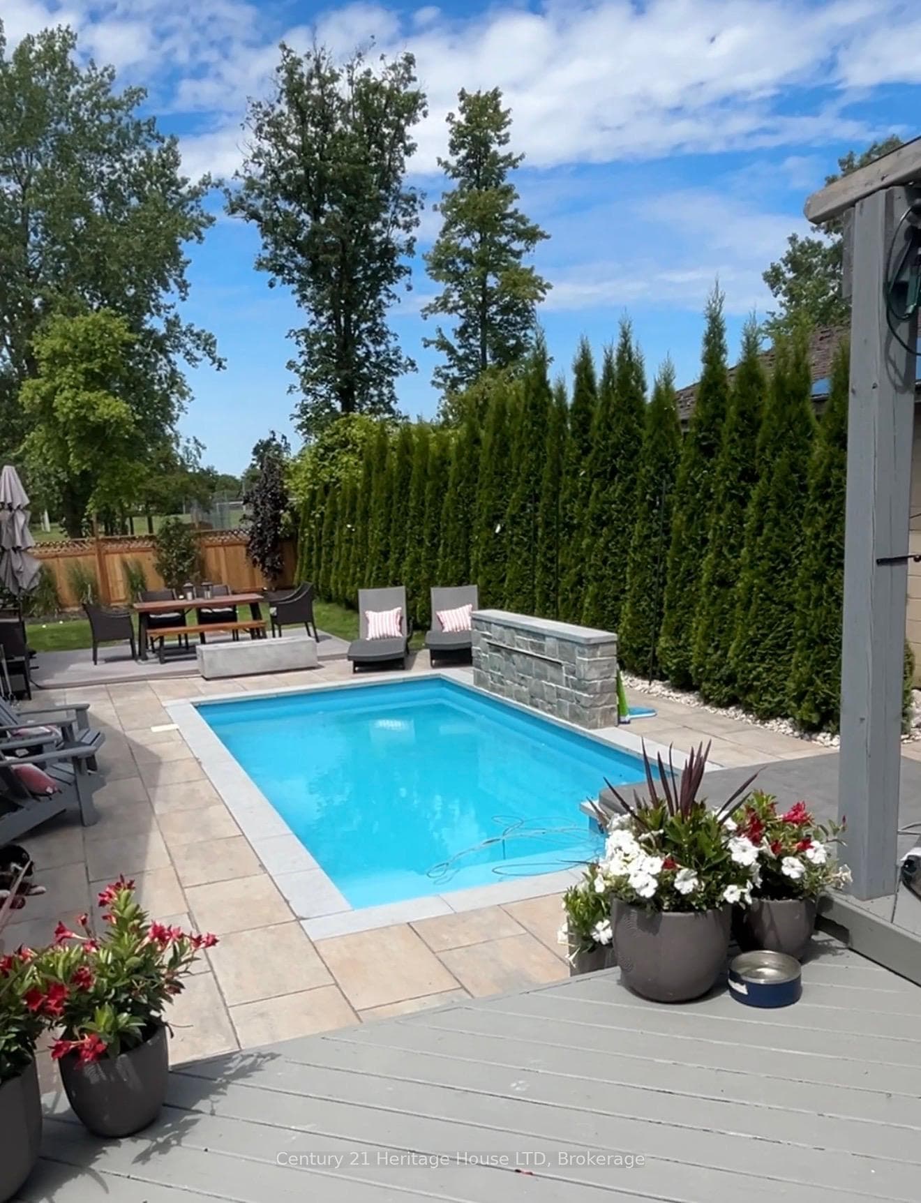 19x26' pool with waterfall, hot tub, kiddie deck