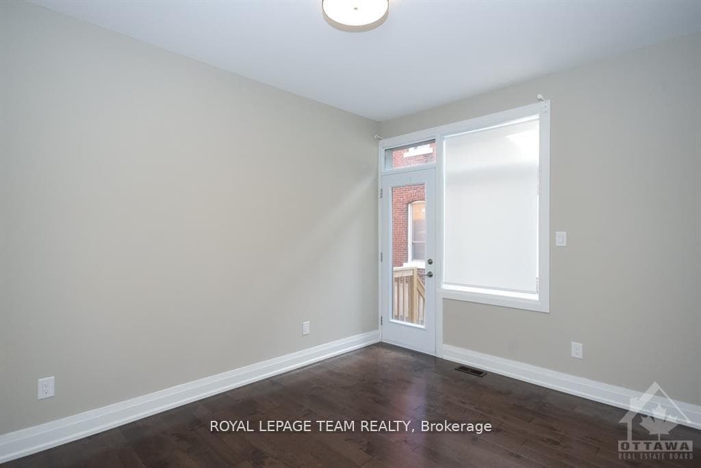 Main floor Bedroom/Home Office with side door