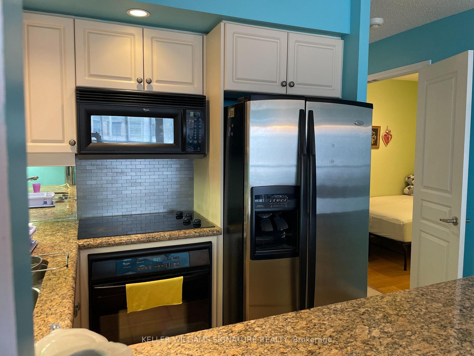 kitchen with view to guest space/den