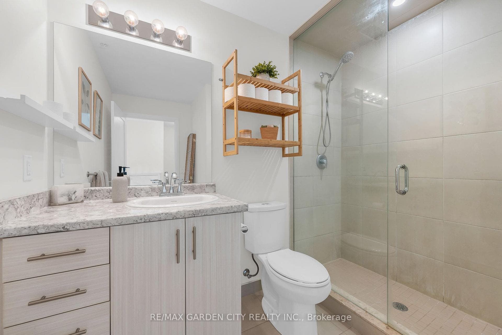 Upgraded toilet and glass shower