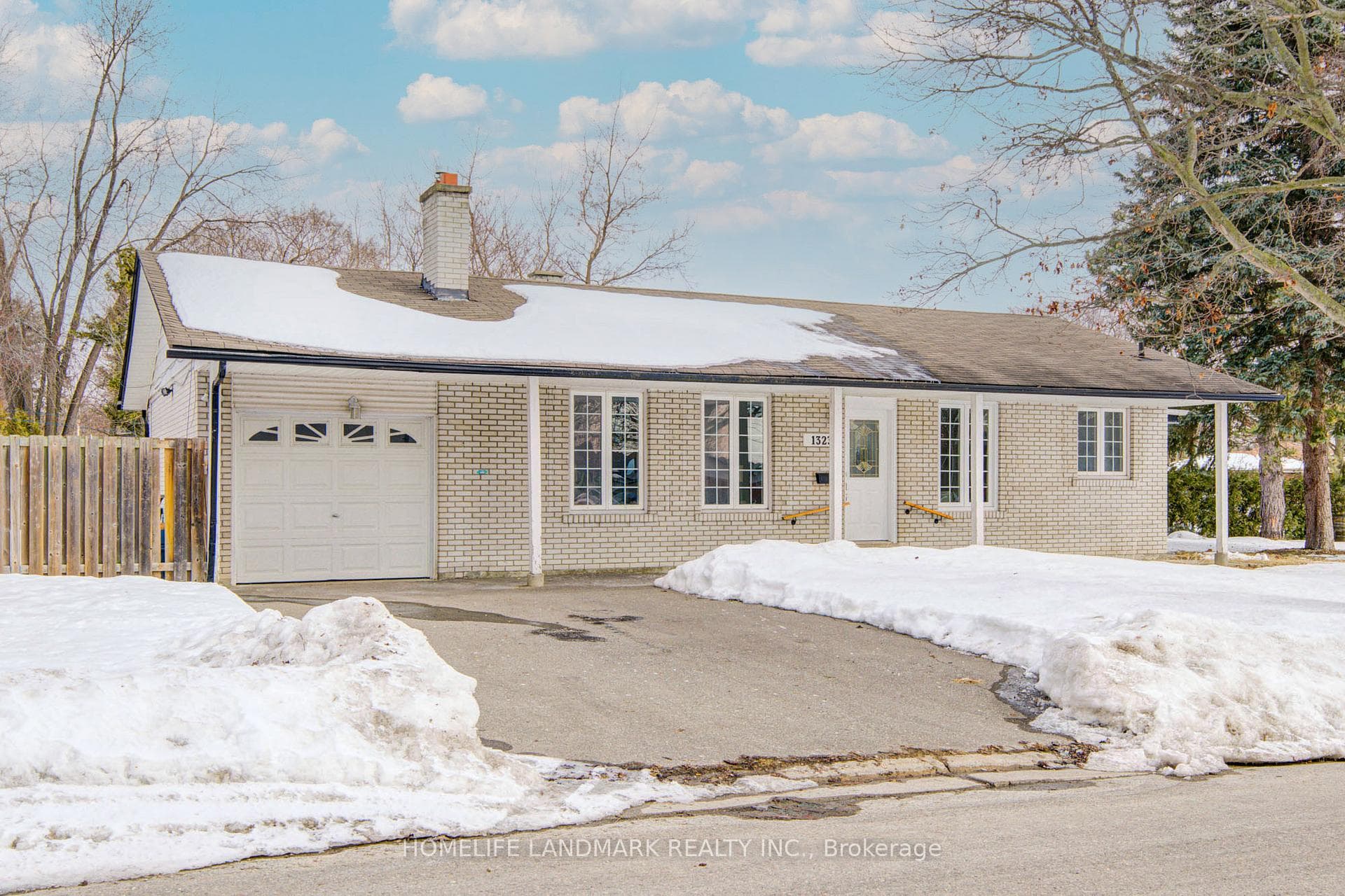 extra wide driveway with plenty parking spaces