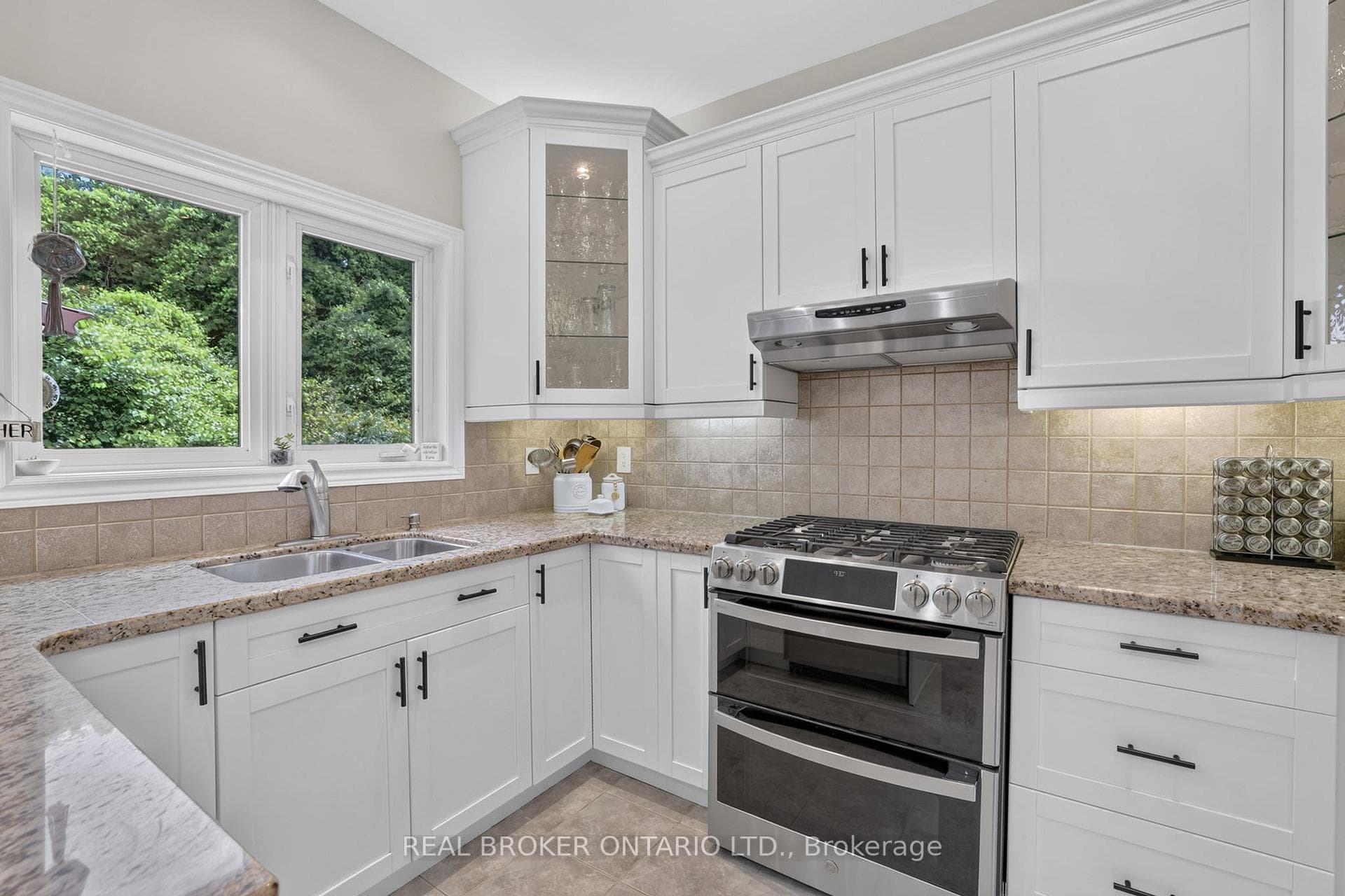 Granite Counters & Views of the Back Yard