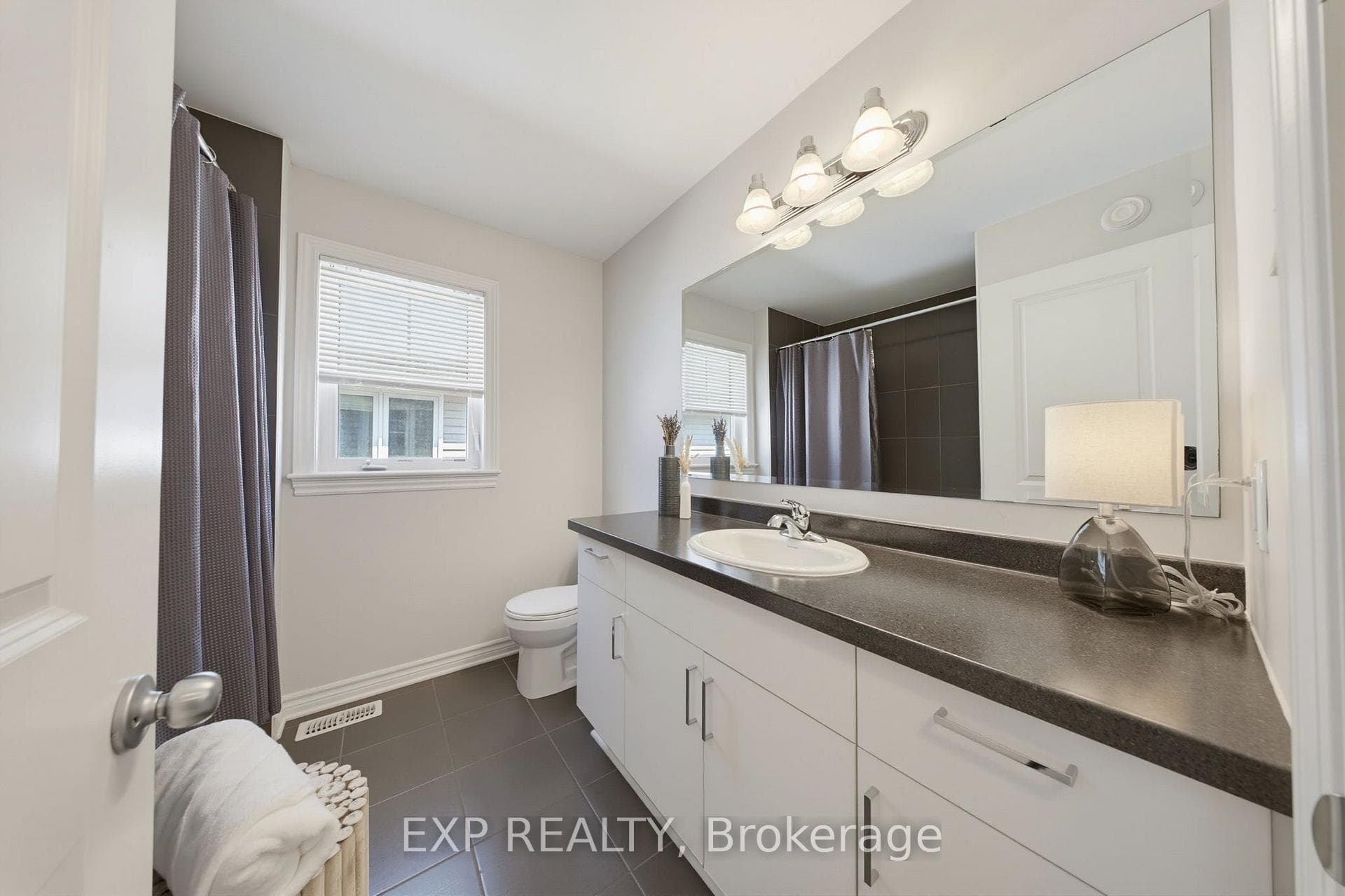 Second Full Bathroom With A Spacious Vanity.