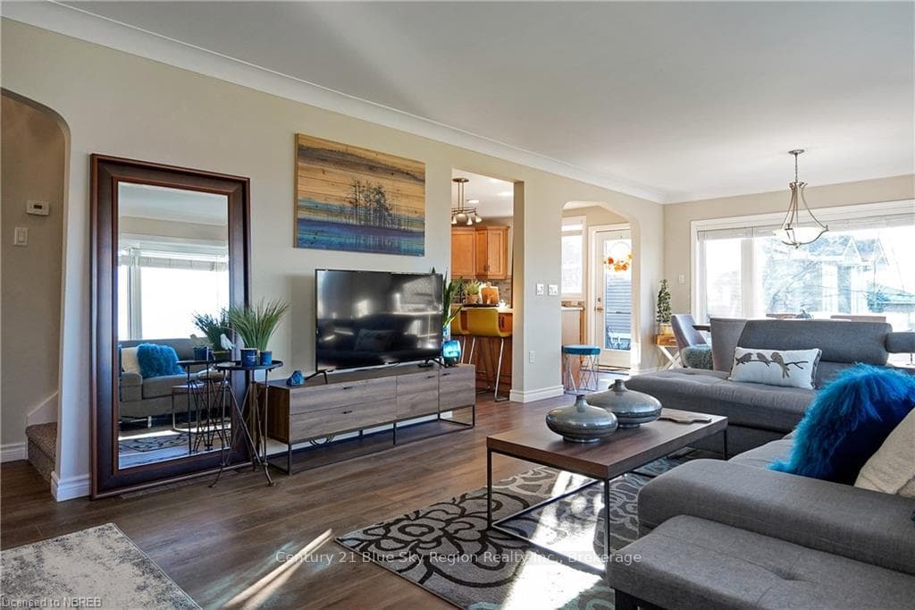 Living room featuring plenty of natural light, dar