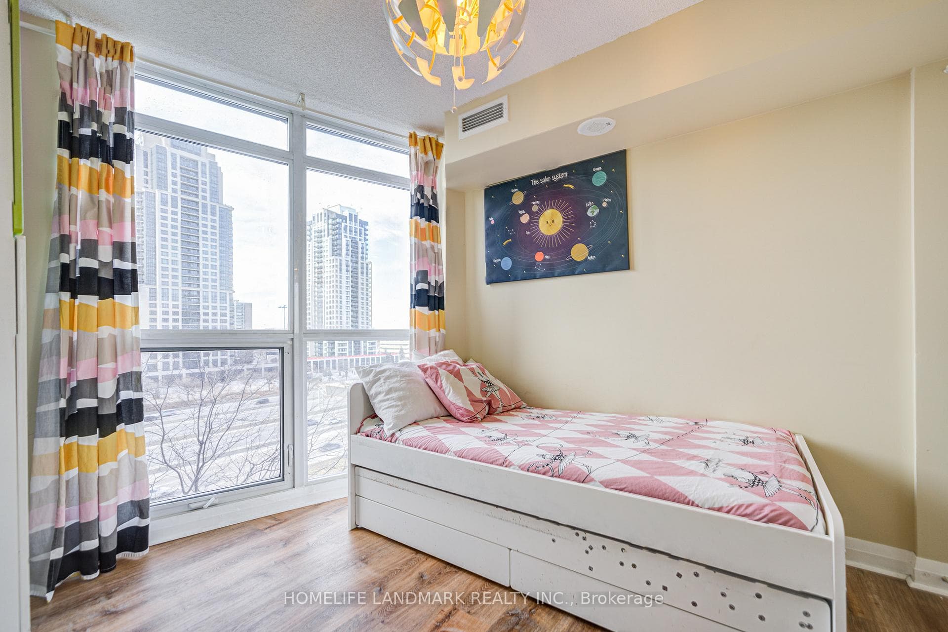 second bedroom with large windows