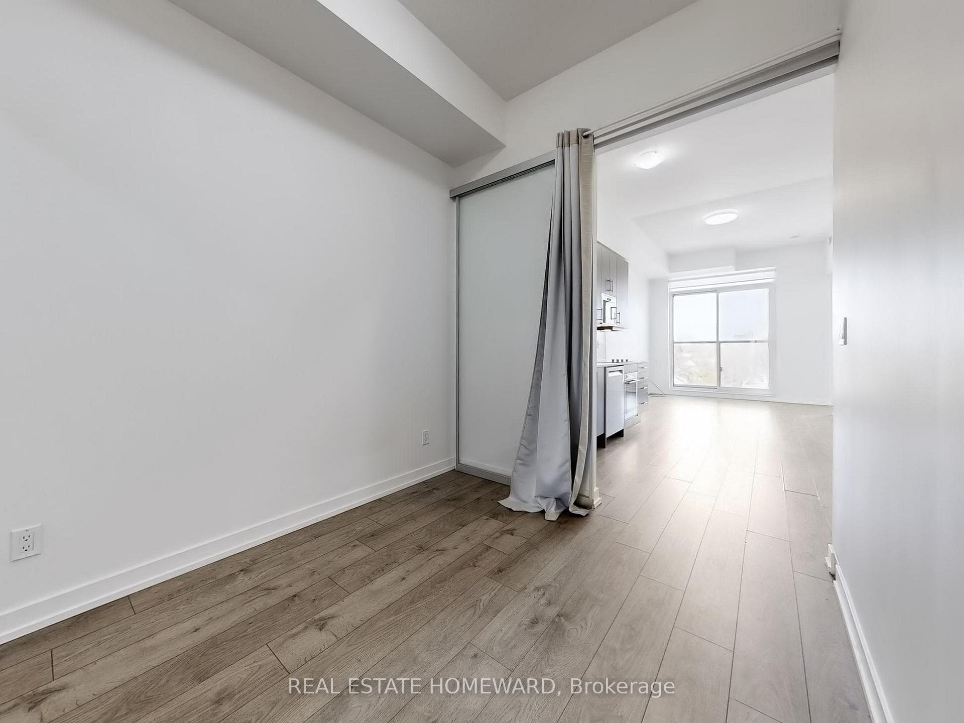 Second Bedroom with Wall-to-Wall Mirrored Closets