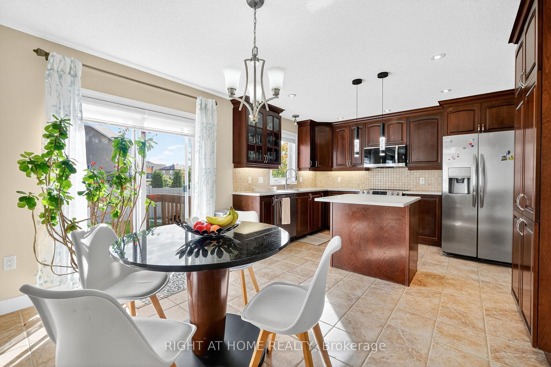 Large overhang counter in island for bar stools.