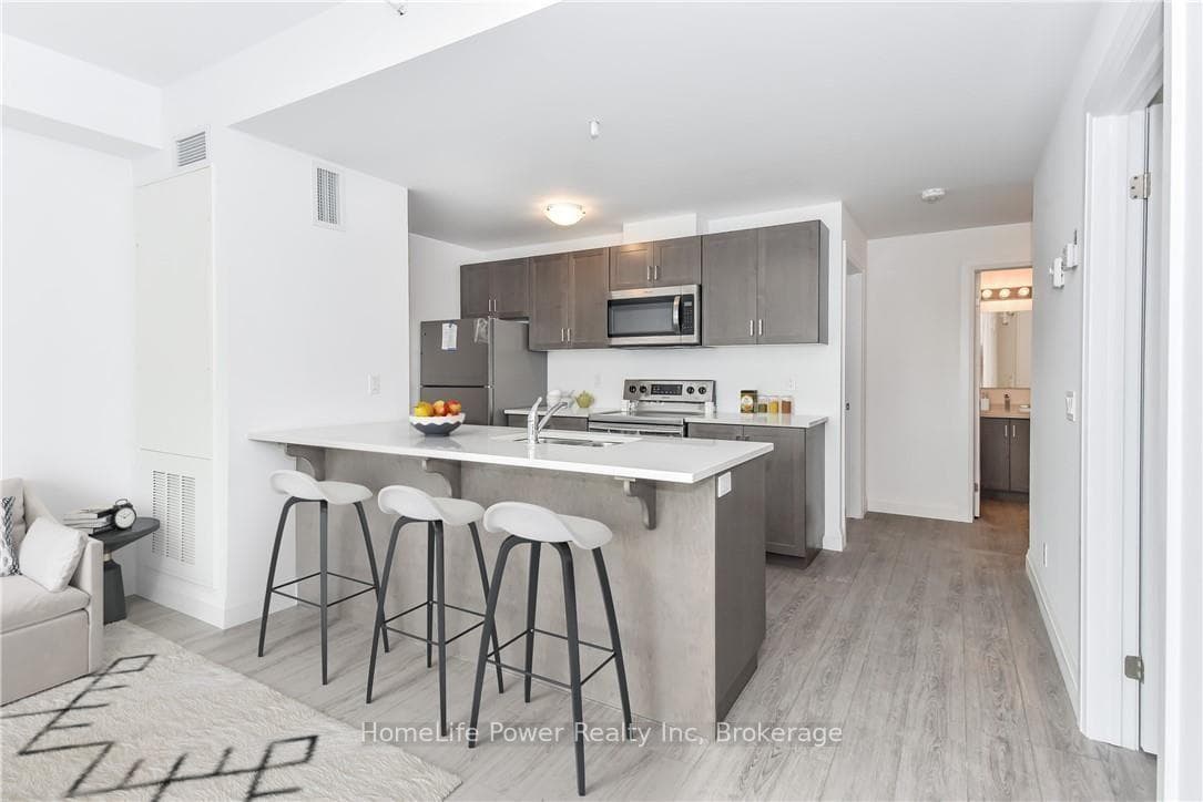 Modern galley kitchen (Virtually Staged)