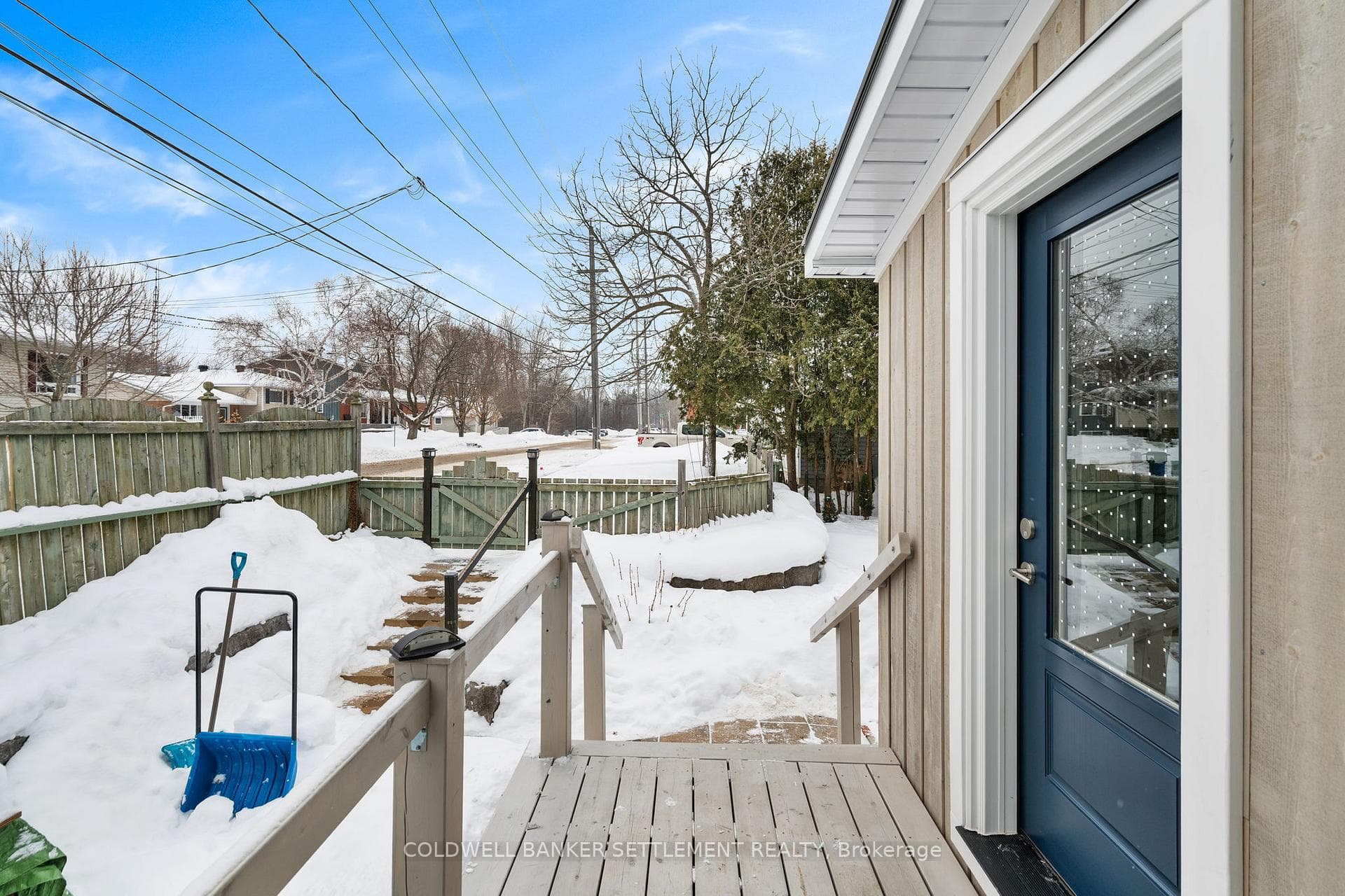Back deck to mudroom, parking area beyond