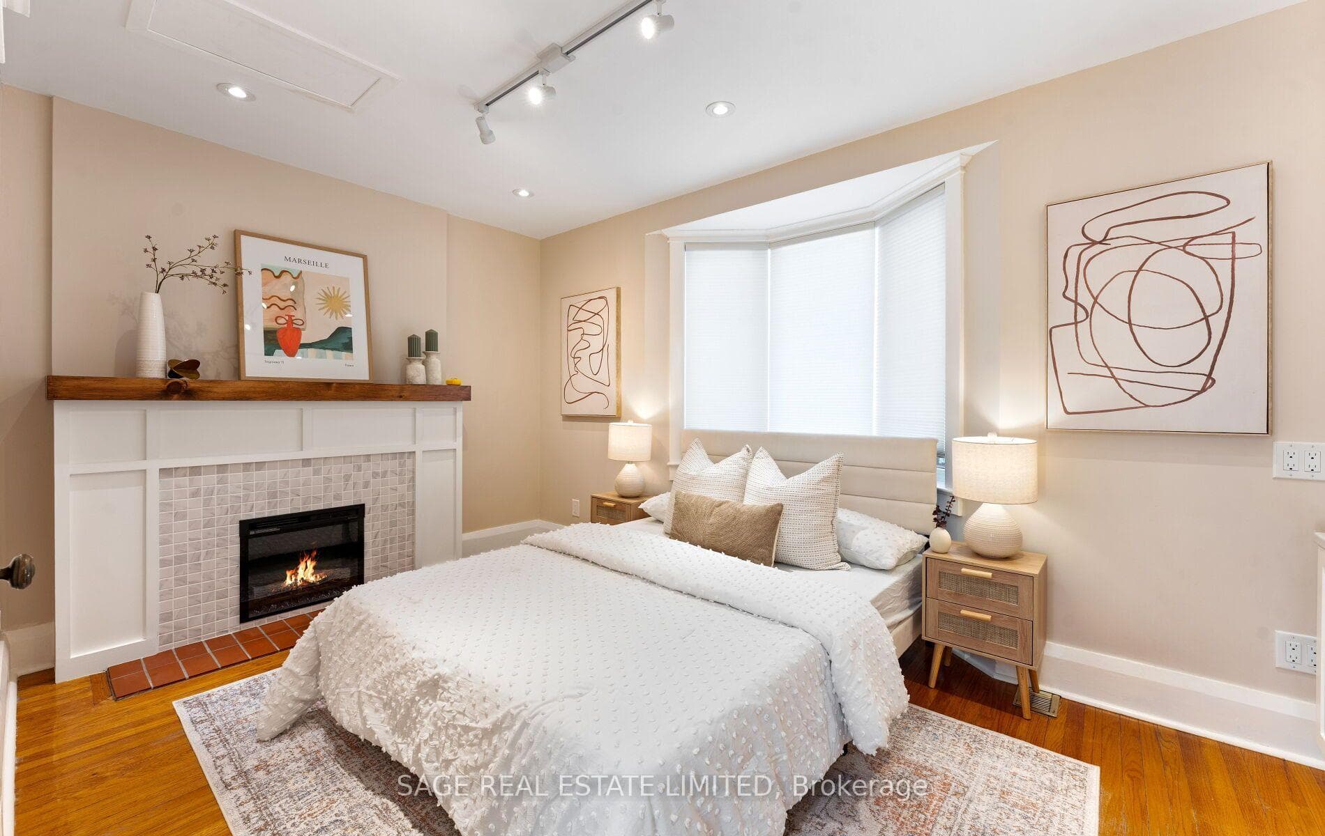 Front bedroom with electric fireplace