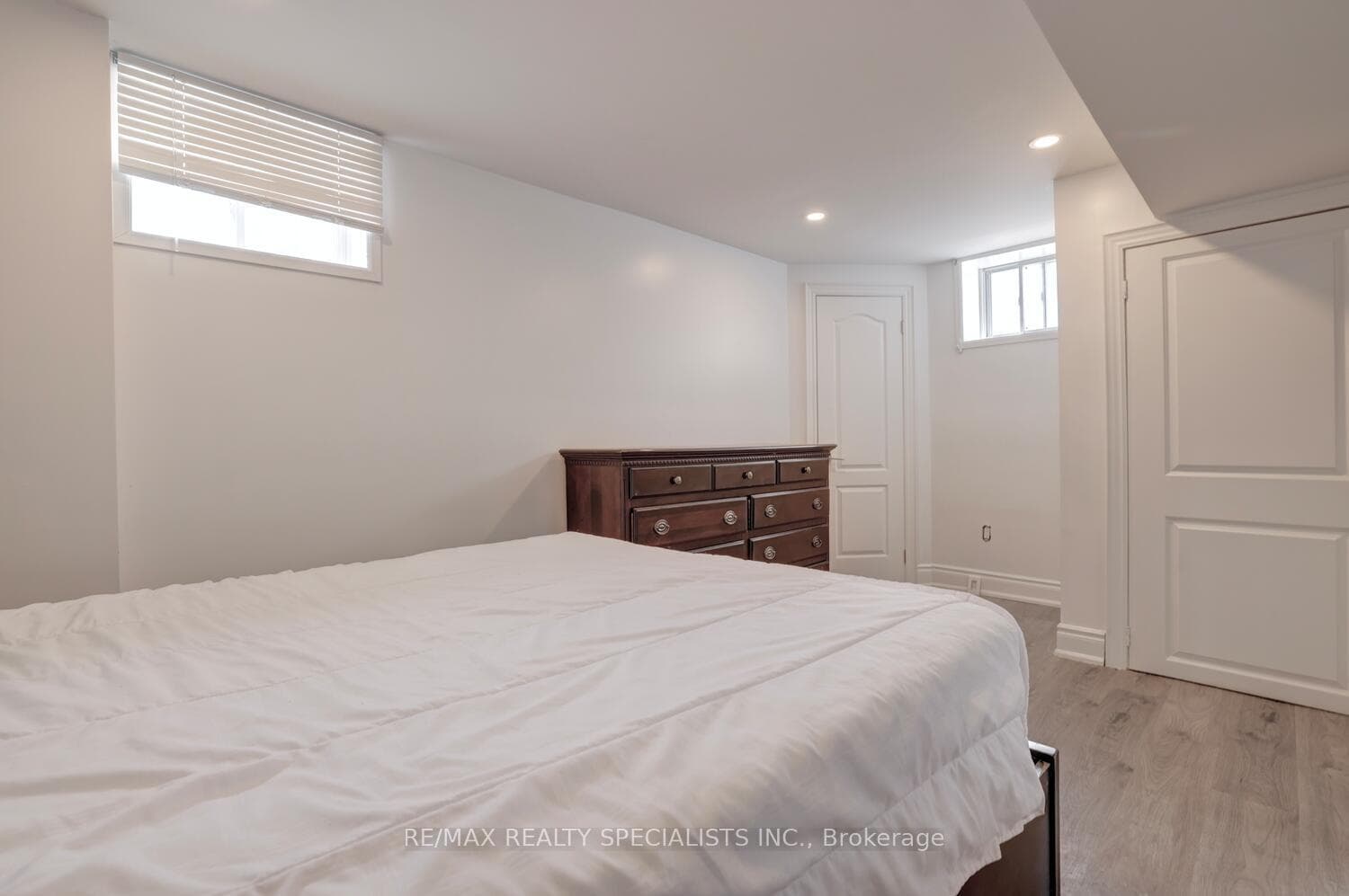 Lower level bedroom with above grade windows.